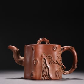 A piece of Wu Yungen's purple sand stump-shaped plum blossom pattern teapot