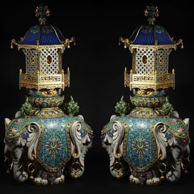 A pair of cloisonné enamel elephant pavilions from the Qing Dynasty