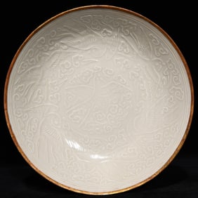 A Song Dynasty Dingyao Baokou carved flower plate