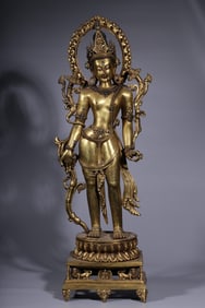 A bronze gilt inlaid treasure holding a lotus Guanyin statue of the Qing Dynasty