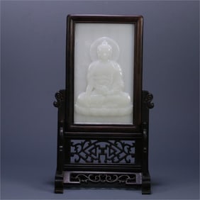 A piece of Hetian white jade Shakyamuni from the Qing Dynasty interstitial