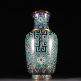 A Qing Dynasty bronze gilt cloisonne twig floral vase