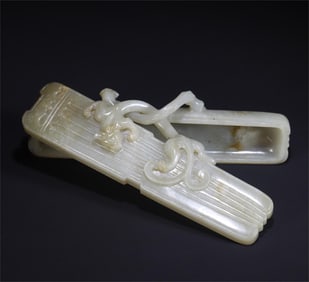 A piece of Hetian jade qin-shaped glass dragon box study