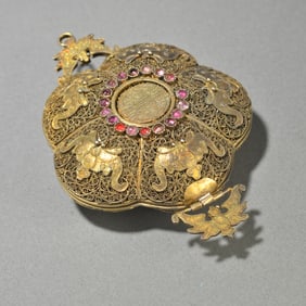 A silver-gilt "Five Blessings for Longevity" sachet pendant