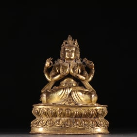 A bronze gilt four-armed Guanyin statue of the Qing Dynasty