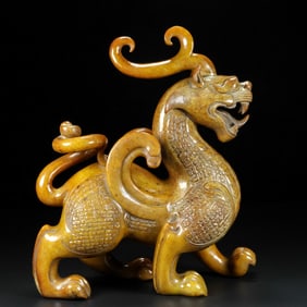 A piece of Hetian jade beast from the Han Dynasty
