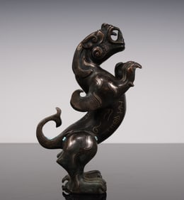 A piece of Han Dynasty Cuo gold and silver beast