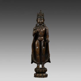 A standing statue of Guanyin in the Pala Dynasty of the Qing Dynasty with bronze and silver inlays