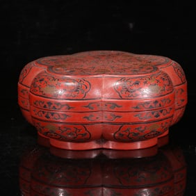 An old lacquerware with a floral pattern lid box from the palace office