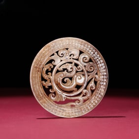 A piece of Han Dynasty Hetian jade full of hollow dragons
