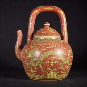 A yellow and red dragon pattern handle pot made in the year of Longqing in the Ming Dynasty
