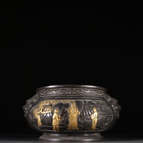 A Ming Dynasty bronze gilt character story incense burner