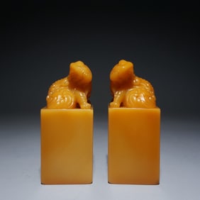A pair of Chen Julai's carved yellow beast button seals
