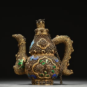 A silver-gilt filigree burnt blue carved gourd-shaped teapot