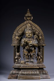 A Qing Dynasty alloy copper inlaid silver treasure tent statue