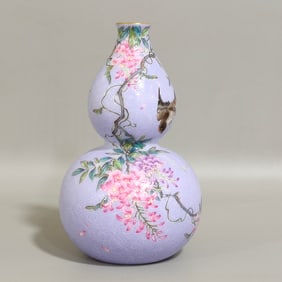 A pair of enamel color violet flowers and birds made in the Qianlong year of the Qing Dynasty