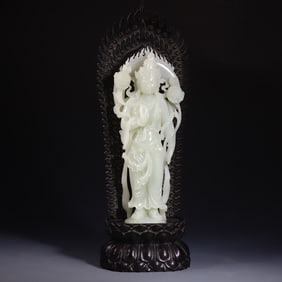 A piece of Hetian jade white jade Guanyin seated statue ornament