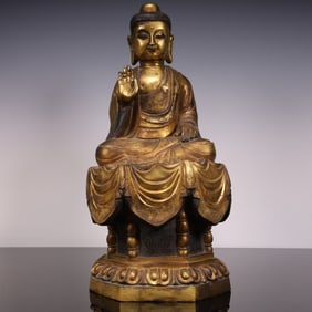 A piece of bronze gilt Buddha