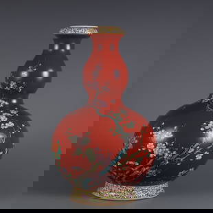 A coral red bottom and pastel plum blossom pattern gourd bottle made in the Qianlong year of the: Qing Dynasty Qianlong year coral red bottom with pastel plum pattern gourd bottle Size: H:31.6cm Belly D:18cm Mouth D:5cm (The Dimensions Of All Batches Are Manually Measured.If You Need More Detailed