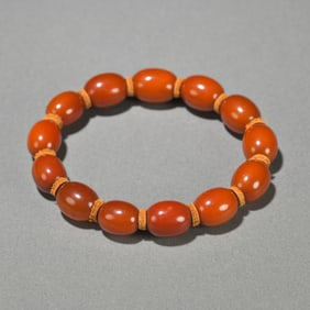 An old beeswax date bead bracelet
