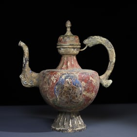 A large wine jug engraved with painted bronze