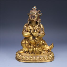 A bronze gilt statue of the Vajra Protector