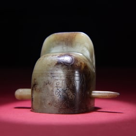 A piece of Hetian jade full of mercury Qin hat crown