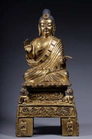 A Qing Dynasty Tang-style bronze gilt statue of Amitabha Buddha