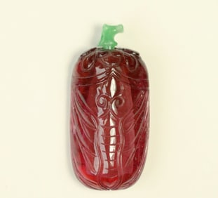 A piece of rubellite tourmaline cicada-shaped snuffbox with emerald sprig lid