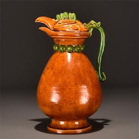 A brown eagle head pot from the Tang Dynasty