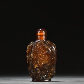 A piece of natural amber is a snuff box