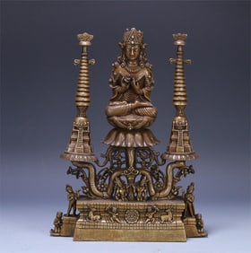 A gold, bronze, silver, and silver statue of the king of the world Buddha from the Batora dynasty
