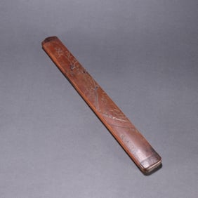 A bamboo carved plum blossom poetry paper cutter