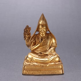 A bronze gilt statue of a Guru made in Beijing from the Qing Dynasty