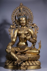 A seated bronze gilt inlaid turquoise green tara from the Qing Dynasty