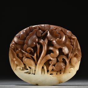 A piece of Hetian jade carving all the way to the branch with plates