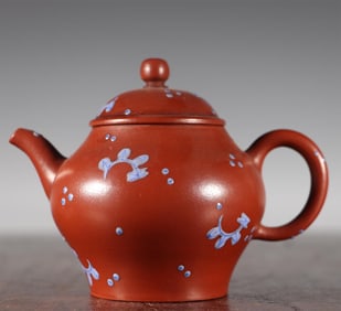 A purple clay pot of vermilion