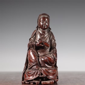 A statue of Guanyin carved in bamboo from the Qing Dynasty