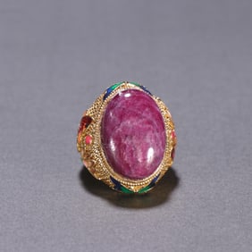A silver-gilt ruby ring