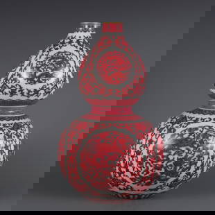 A carmine color kui dragon pattern gourd bottle made in the Qianlong year of the Qing Dynasty: Qing Dynasty Qianlong year carmine color kui dragon pattern gourd bottle Size: H:33cm Belly D:19cm Mouth D:3.6cm (The Dimensions Of All Batches Are Manually Measured.If You Need More Detailed Informat