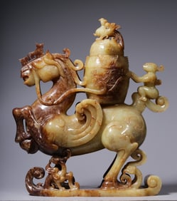 A piece of Hetian jade god in the Han Dynasty drove the Pegasus beast face pattern appreciation