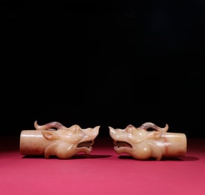 A pair of Han Dynasty Manqin jade dragon head inlays