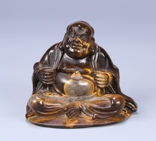 A tiger's eye stone arhat ornament from the Qing Dynasty