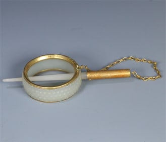 A piece of Liaojin Hetian jade wrapped copper gilt headband