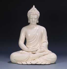 A Ming Dynasty statue of Sakyamuni in Zongdehua porcelain