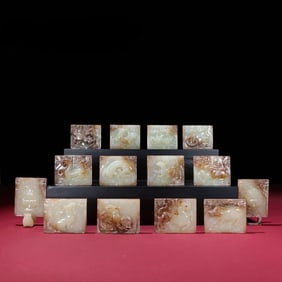 A set of Hetian white jade shengkeng zodiac belt plates