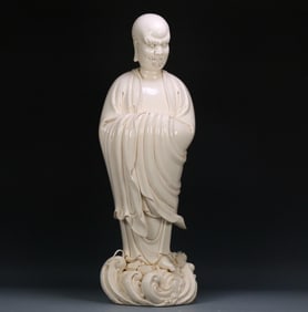 A Ming Dynasty Zongde porcelain Arhat statue