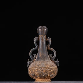 A silver gilt fried bead double dragon ear bottle from the Tang Dynasty