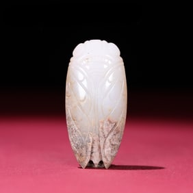 A piece of Hetian white jade full of jade cicadas