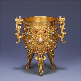A piece of bronze gilt gold ou permanent cup